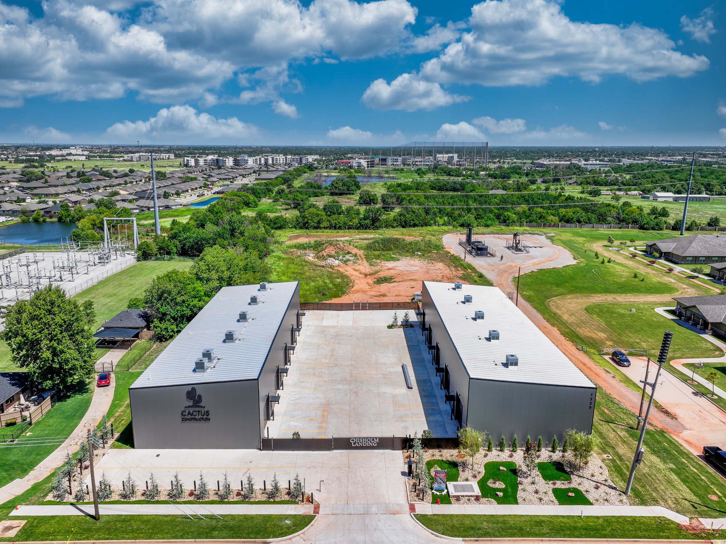 Overhead view of two commercial flex buildings and their shared service yard