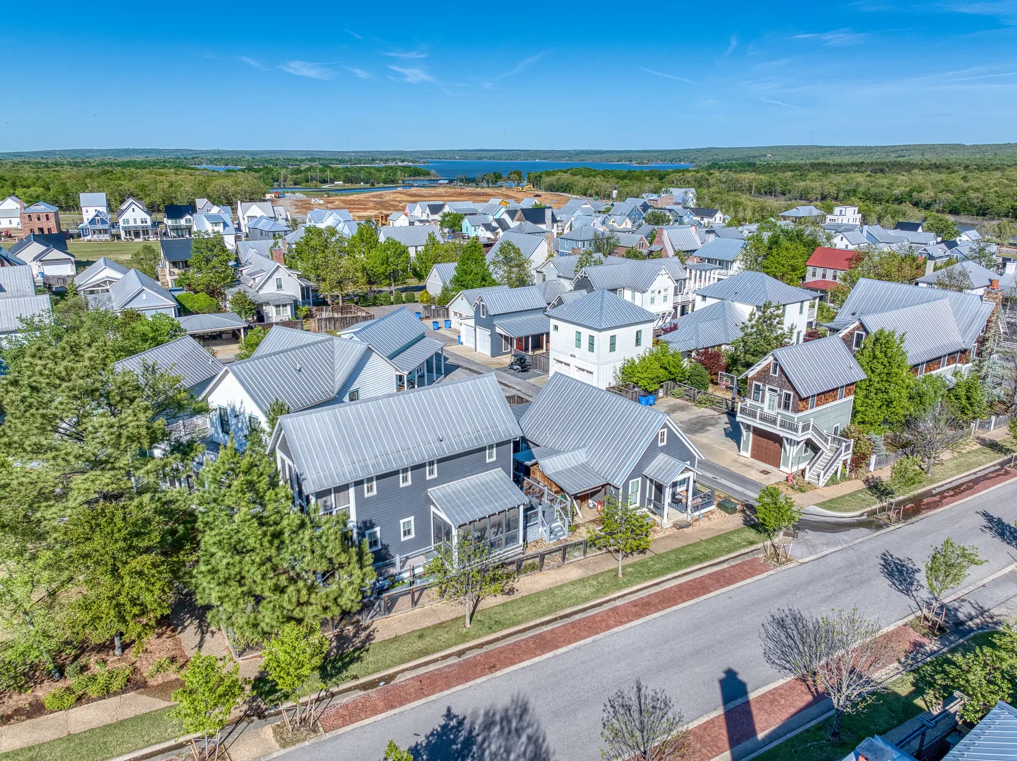 Aerial view of a lakeside planned community of cottage homes